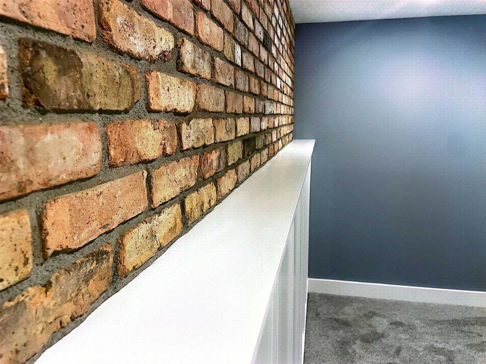Brick wall and wainscot cap detail