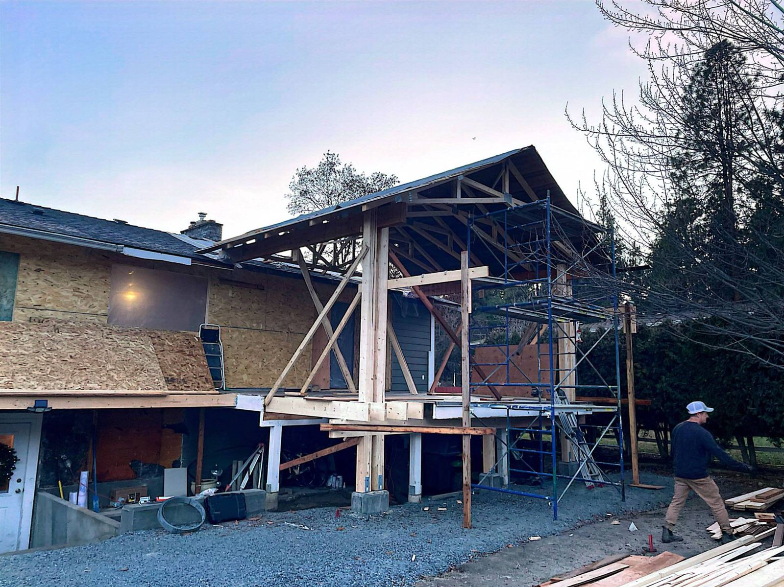 Covered deck framing with timber trusses going up