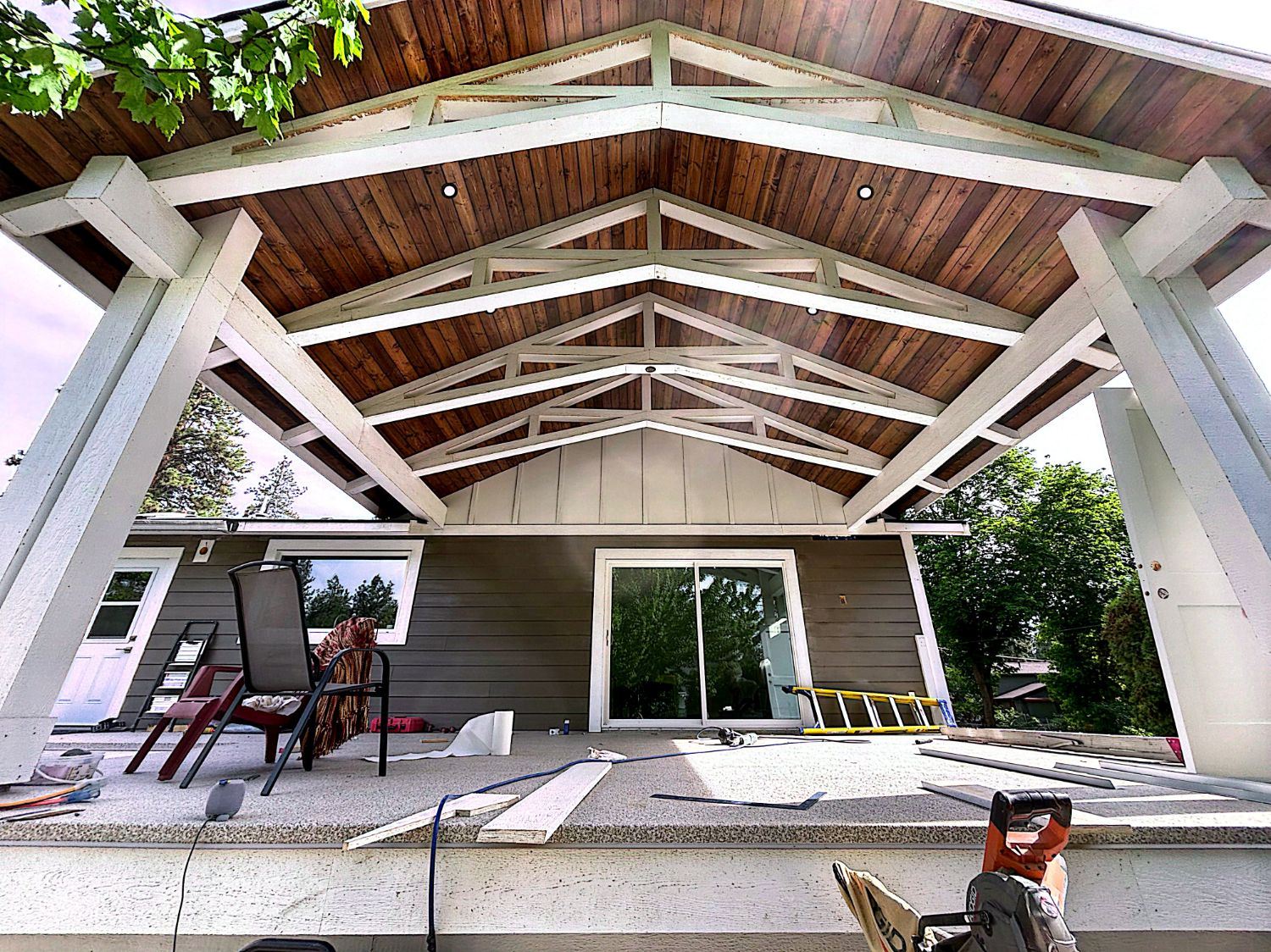 Timber trusses and tongue-and-groove ceiling going up